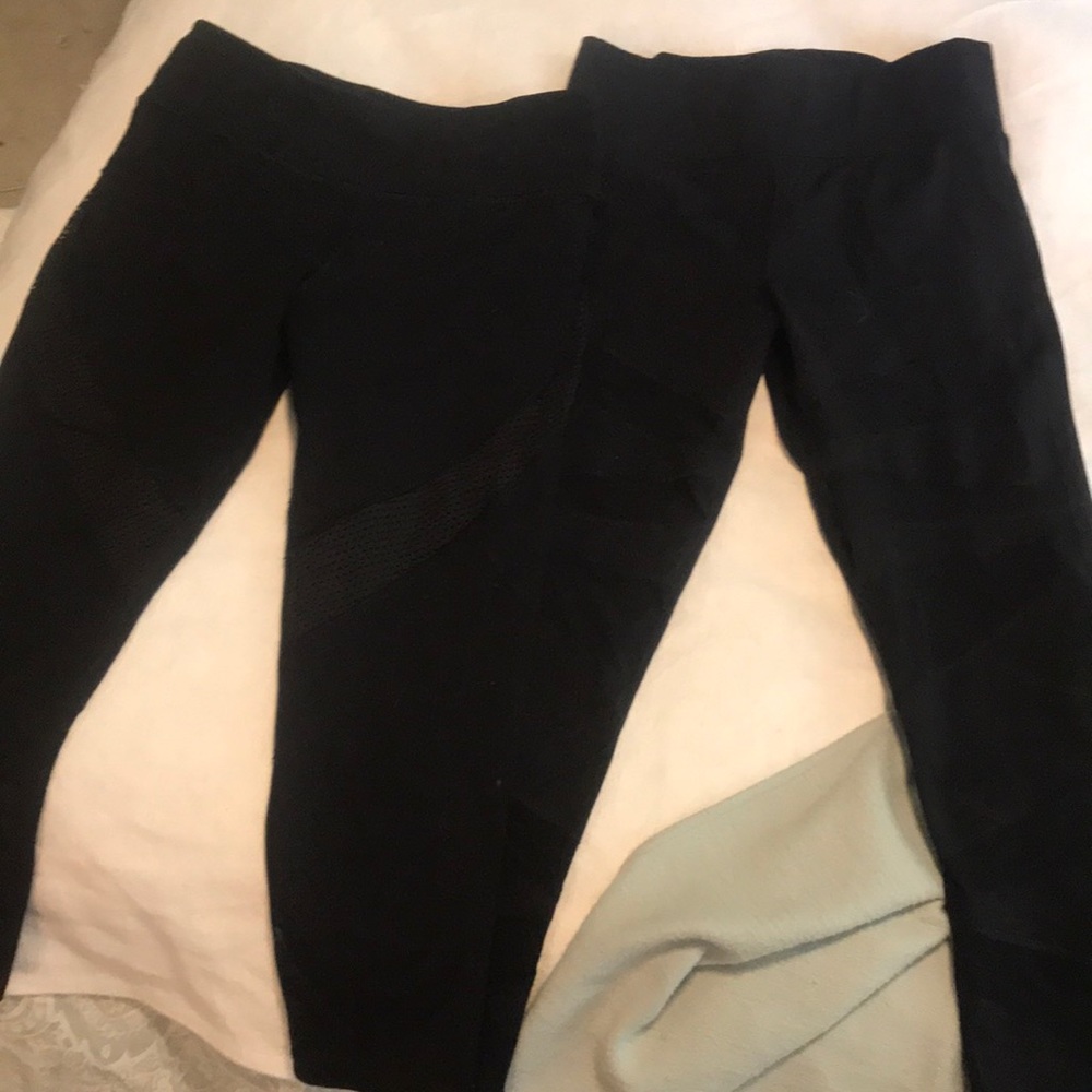 Pair of size small black mesh detail work out pant